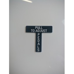 Pull to Adjust rudder sign